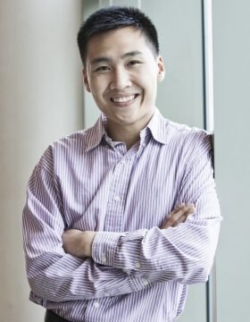 Asian businessman in a business center lobby.